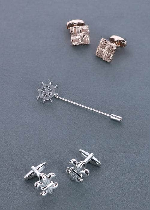 Two cufflinks and  one lapel pin