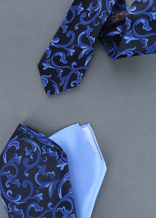 The Christian necktie and pocket square in blue. The Sutton pocket square in blue.